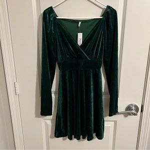 Emerald green velvet dress